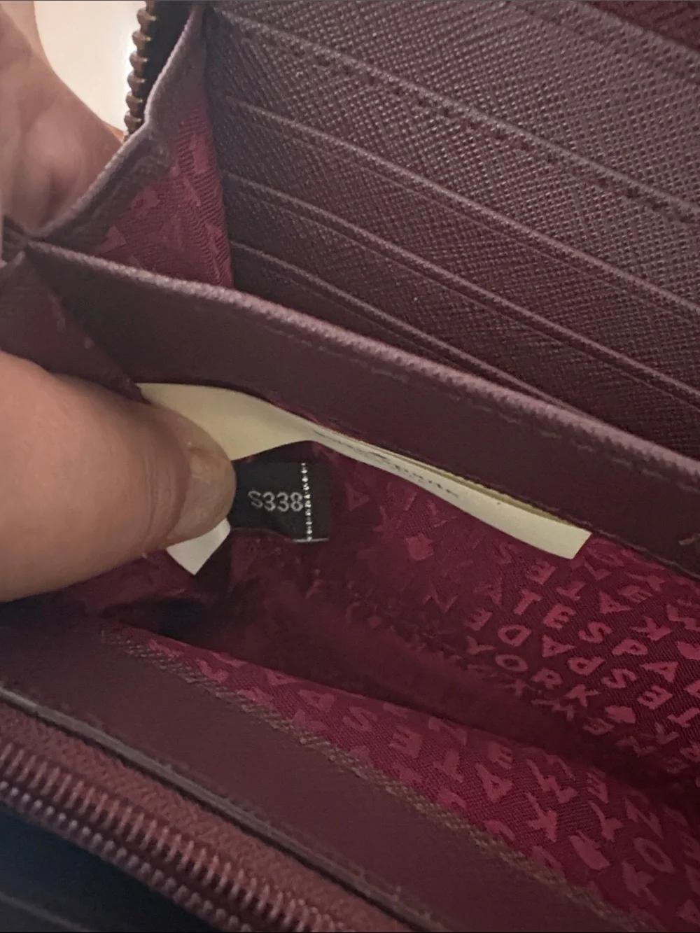 Kate Spade NY Laurel Way Neda Saffiano Burgundy Leather Zip Continental Wallet